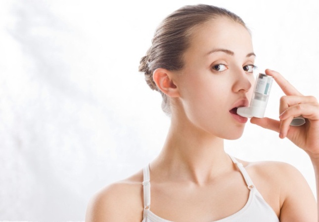 Woman using Inhaler.

More than 300,000 asthma sufferers may not